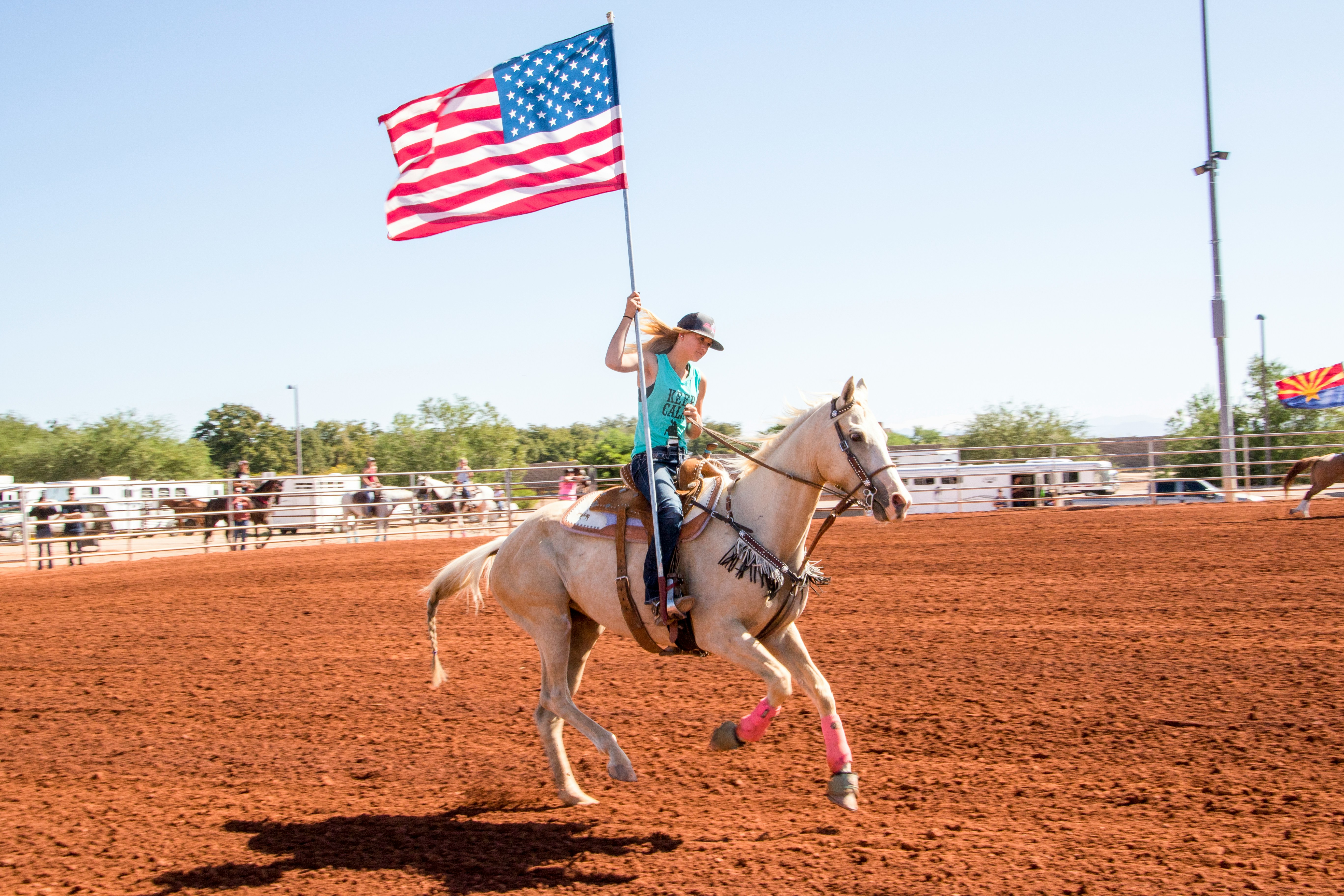 A woman rides a horse in a rodeo hosted by Liberty Hill, a small town outside of Austin